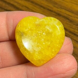 Golden healer heart shaped worry stone